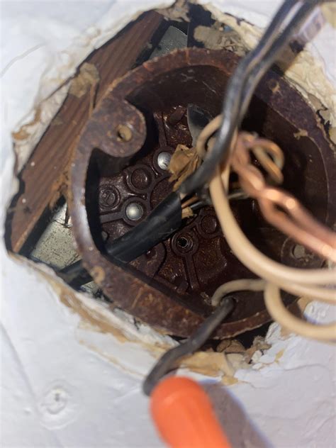 removing ceiling electrical box|removing an old ceiling fan.